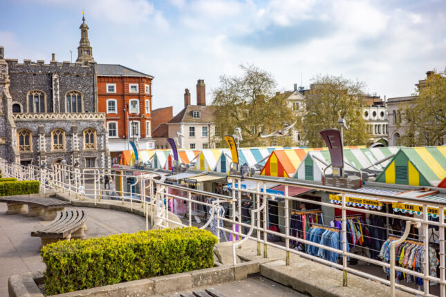 Norwich, Norfolk, UK – April 24 2022. A view over the outdoor market in the city of Norwich.